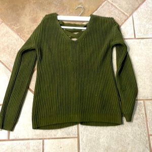 A green sweater